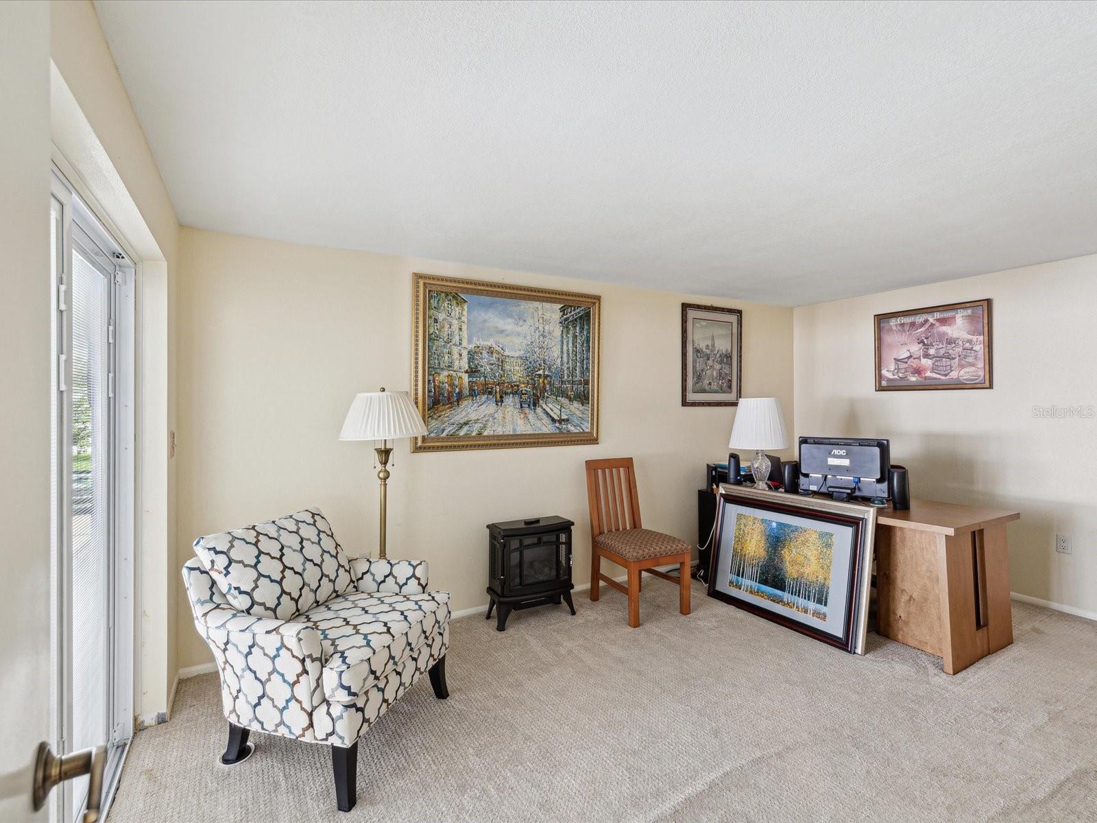 Bedroom 2 w/ Sliding Glass Doors to Pool/Patio Area