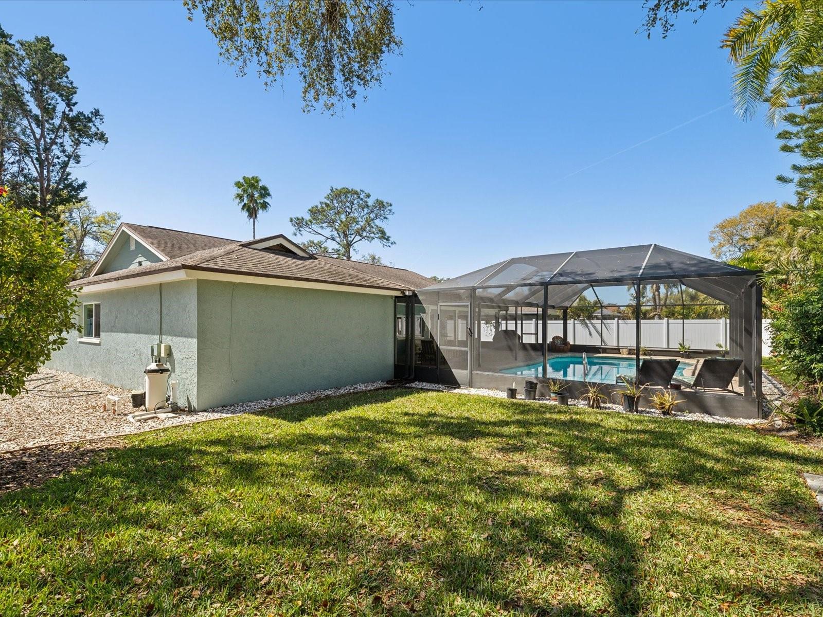 Side Yard Area w/ Mature Landscaping and Shed