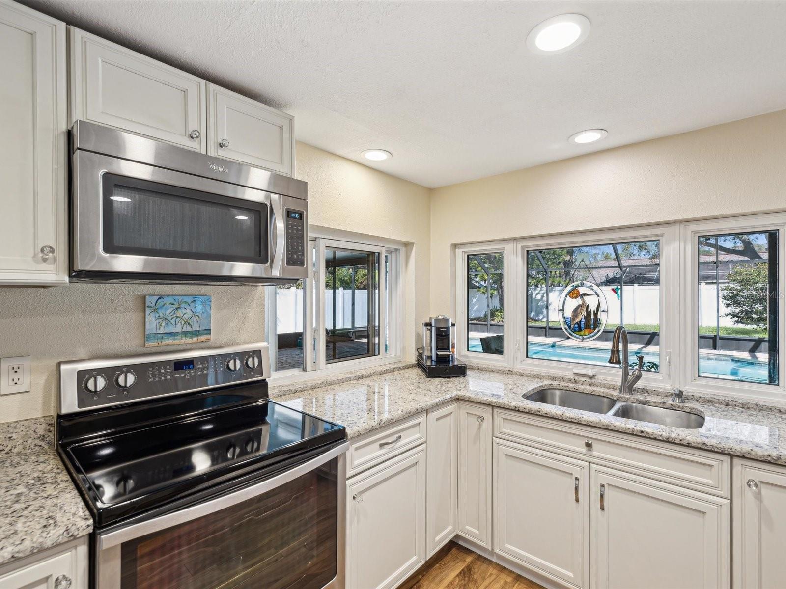 Gorgeous Kitchen w/ Pass Thru Window to Pool/Patio Area