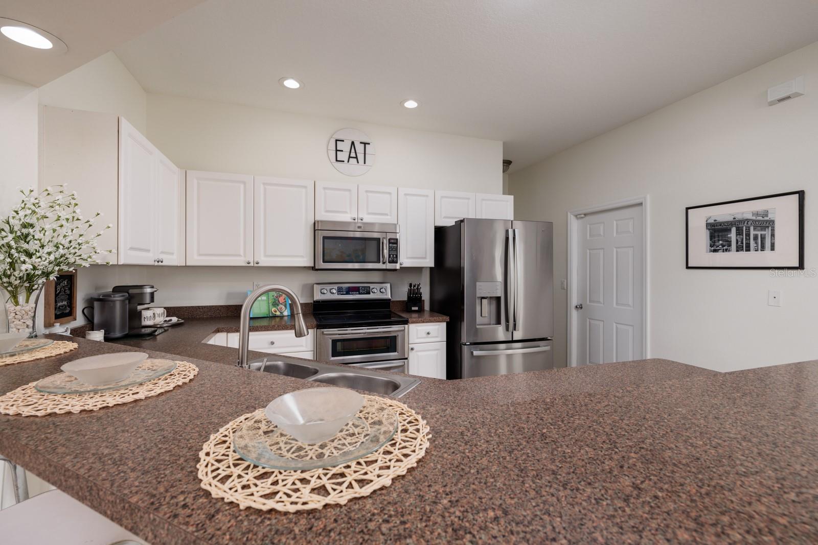 Delightful for cooking with easy access to garage, closet pantry and laundry room.