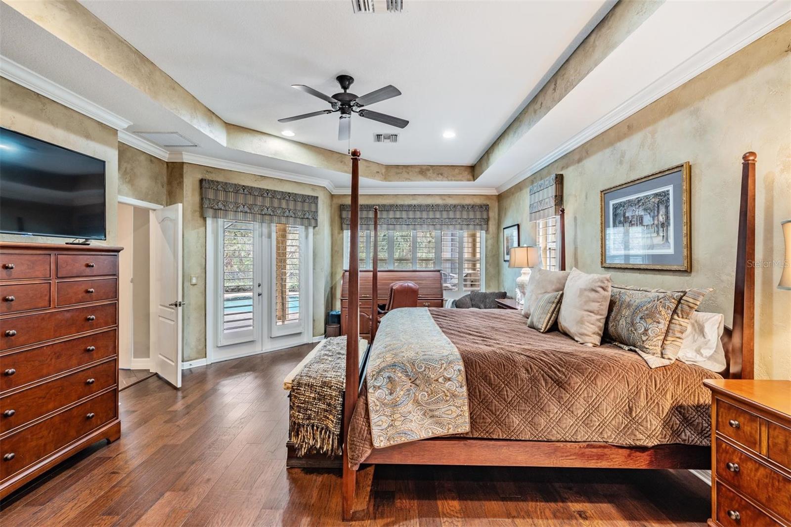 Master Bedroom, Engineered Hardwood Flooring, Plantation Shutters, Inset Ceiling and Ceiling Fan.