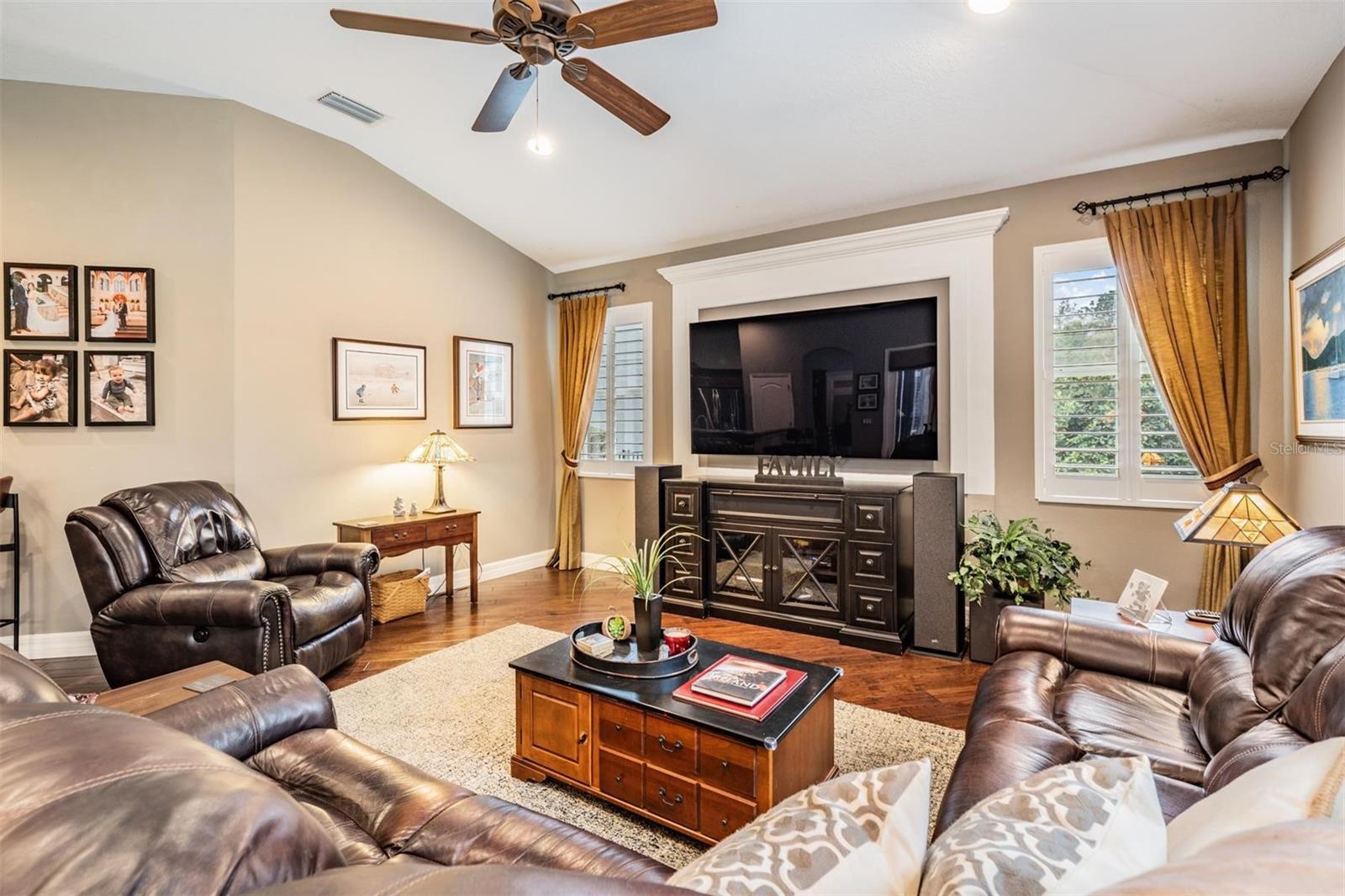 Family Room, High Ceilings, Inset lighting, Engineered Hardwood Flooring, Plantation Shutters.