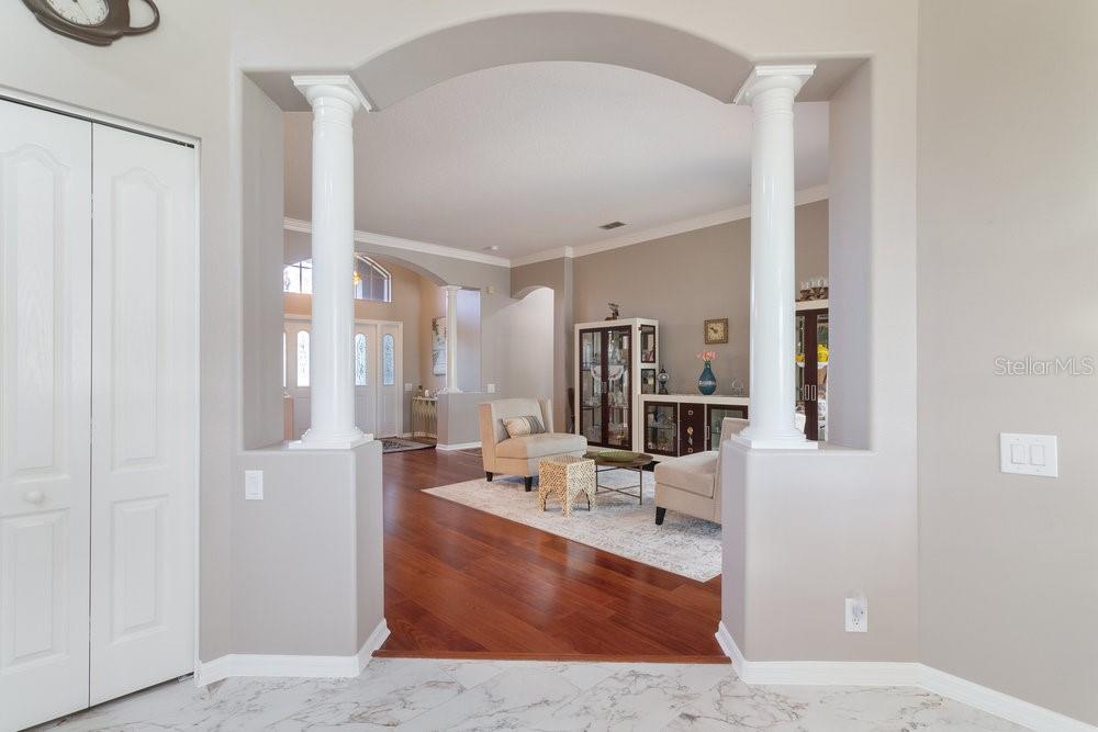 Kitchen looking into the entry and formal area