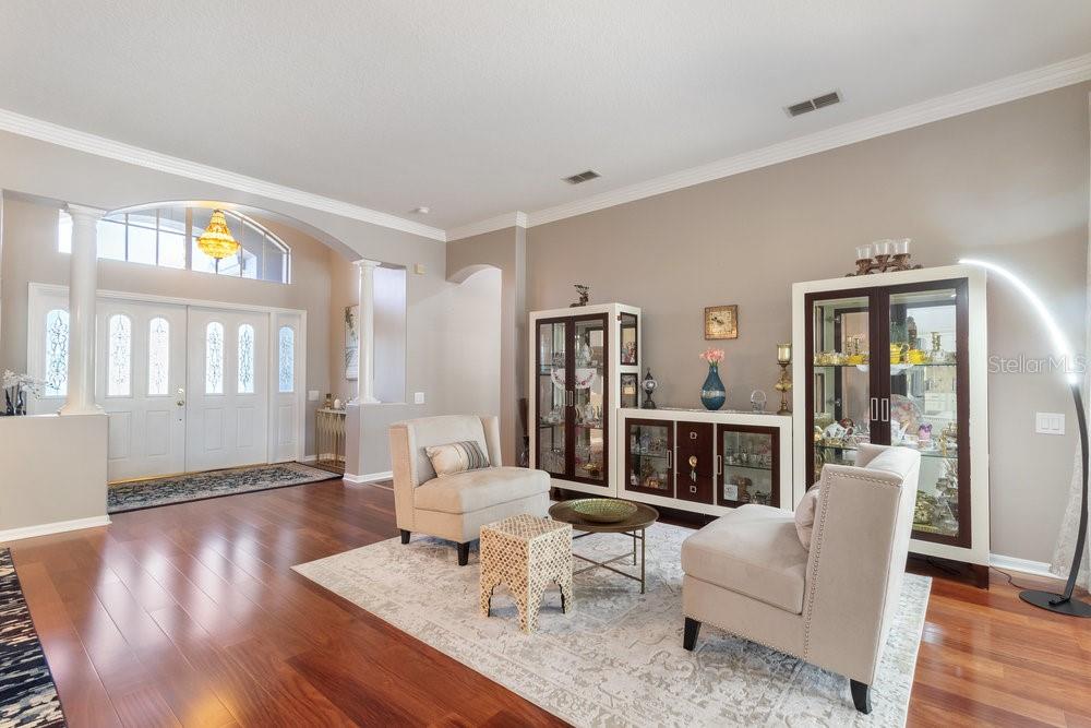 Formal living area looking into the foyer