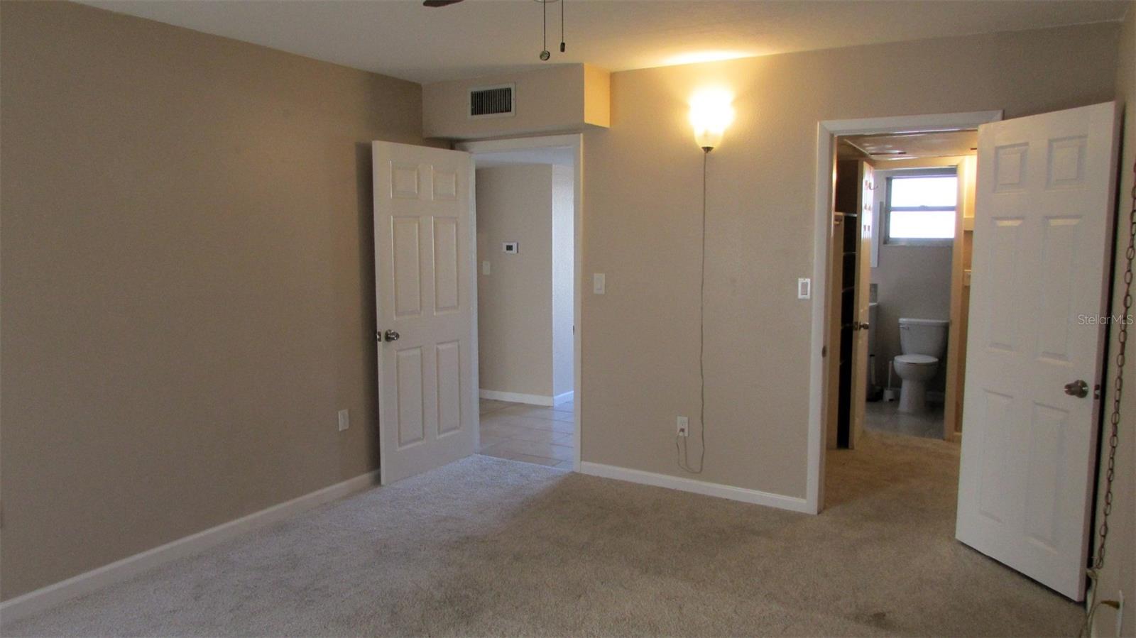 Primary Bedroom with walkin closet