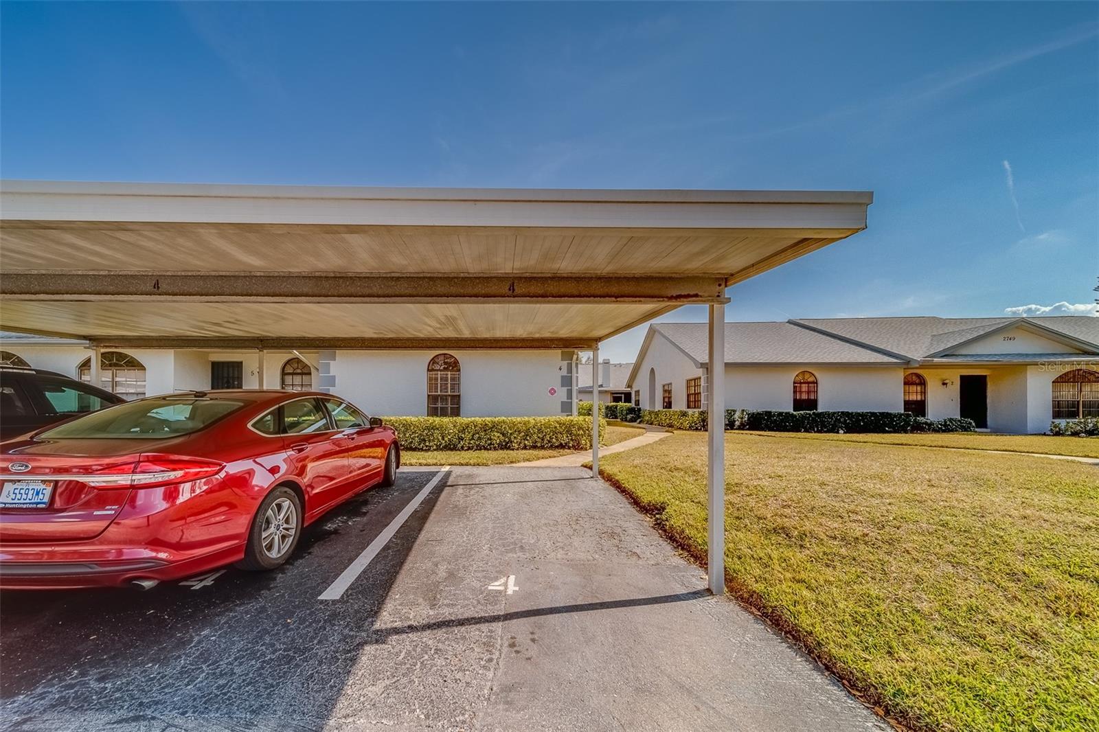 Two Covered Carport Parking Spots