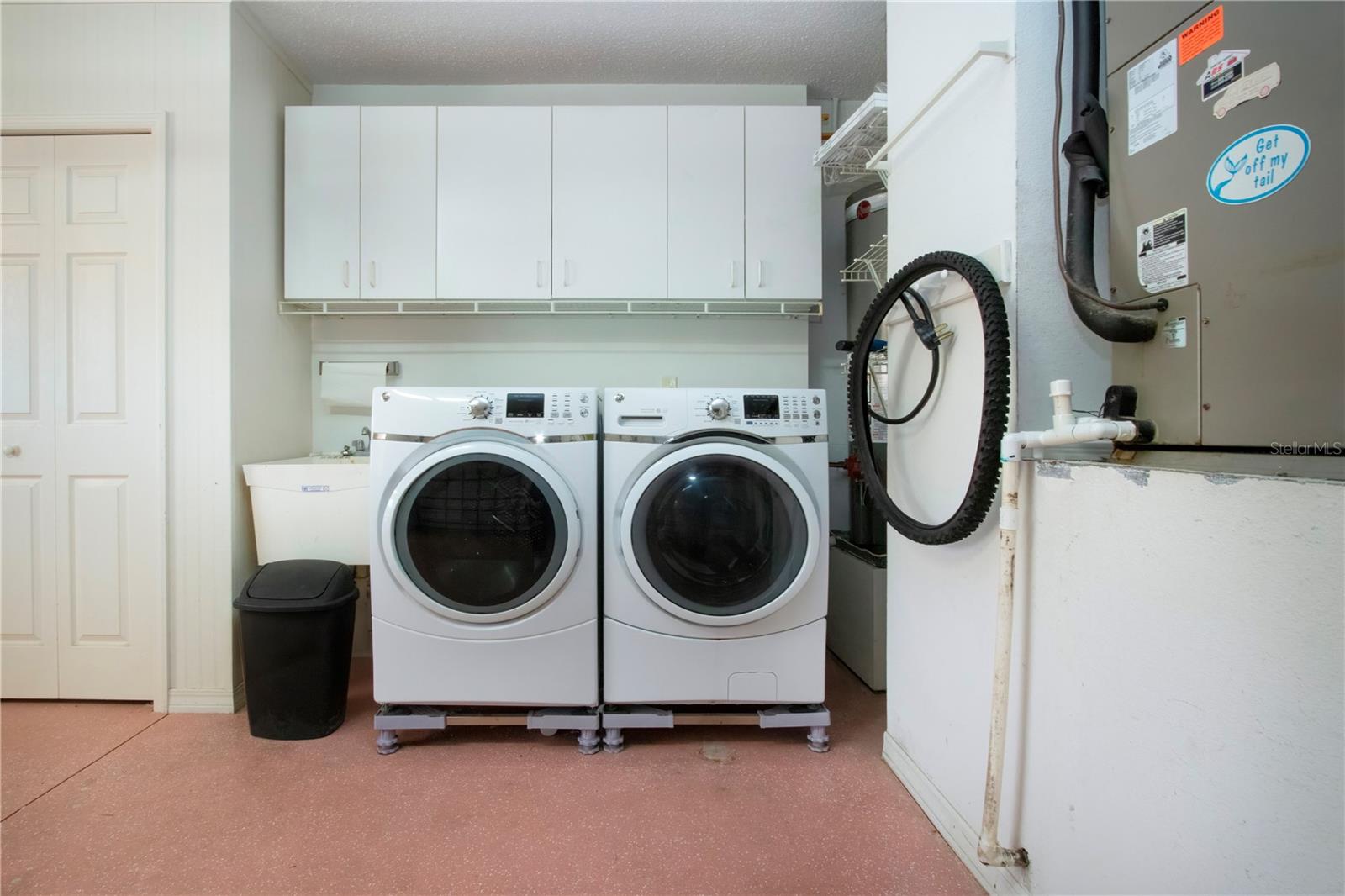 Laundry area in garage can be relocated back inside house