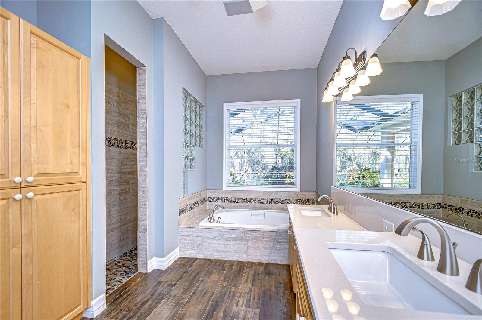 Dual sinks, stand alone soaking tub, and shower!