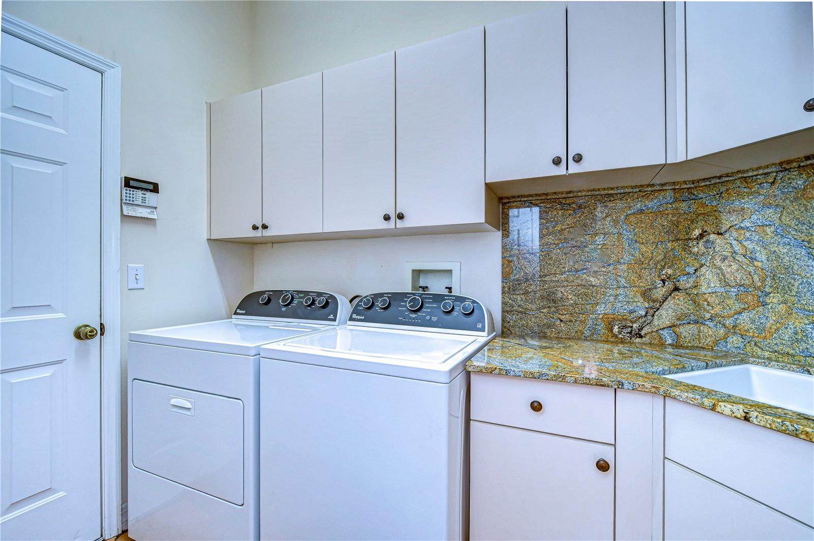 Large laundry room with plenty of storage space!