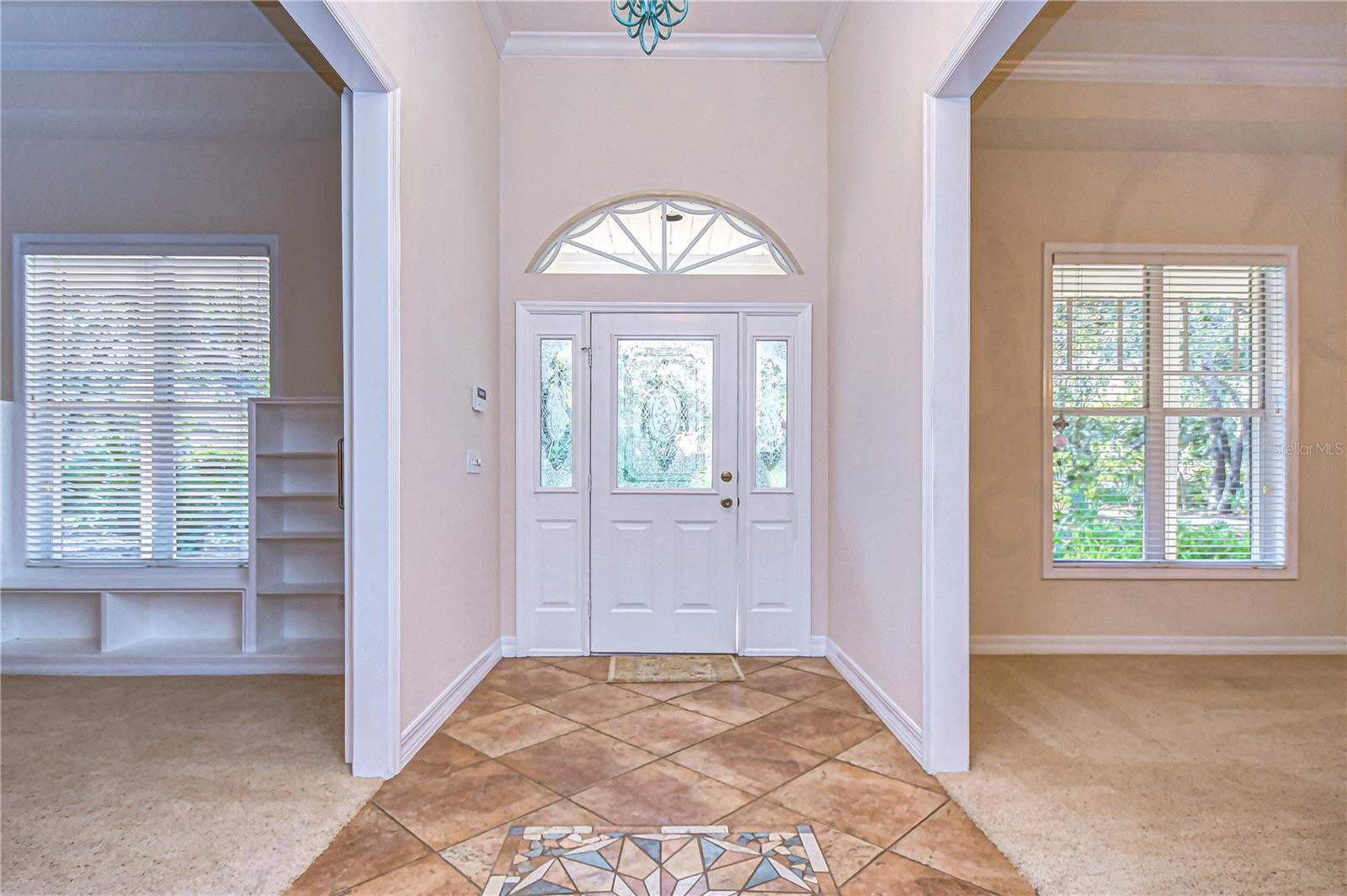 Large foyer with elevated ceilings!