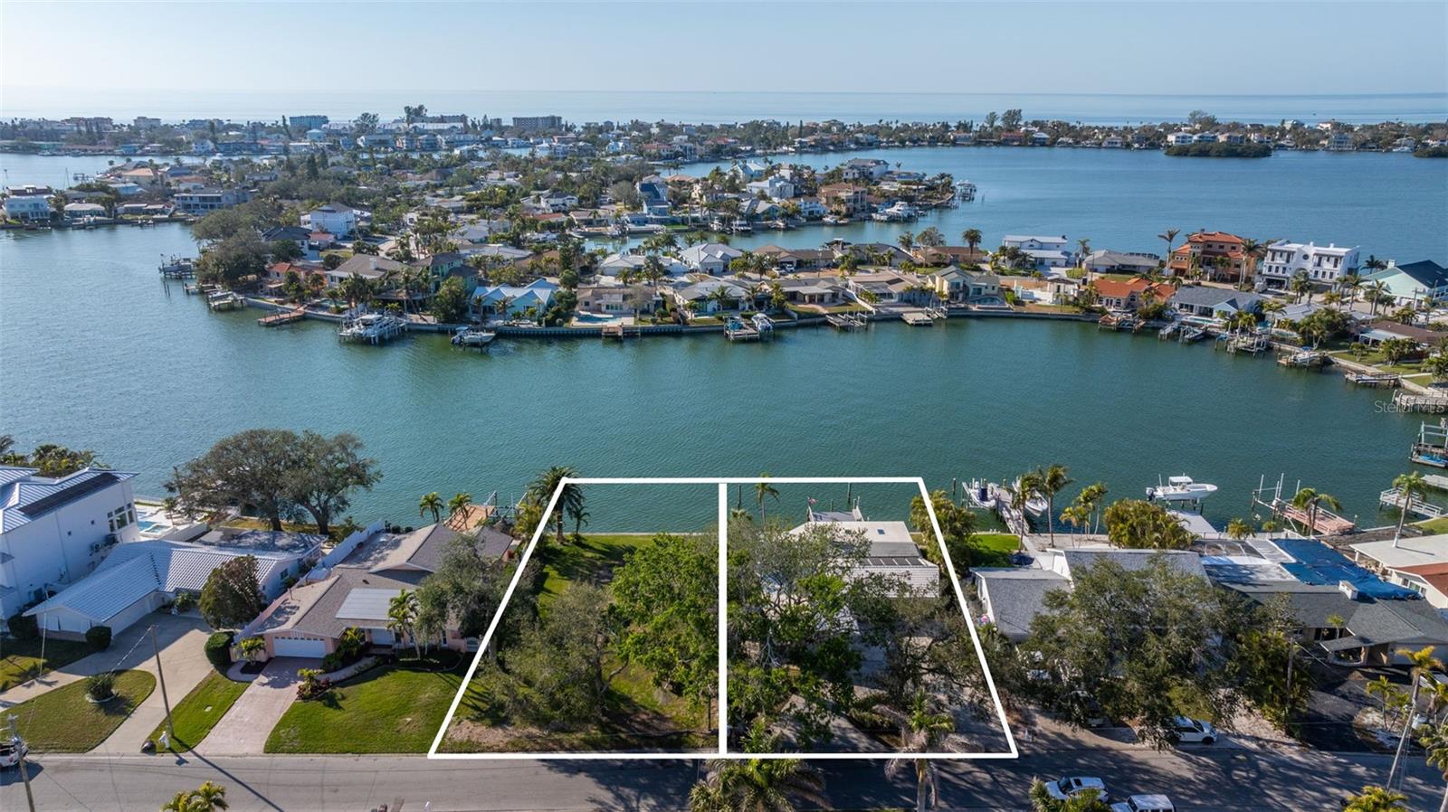 Great lots with sunset views on desirable Harbor Dr N - does it get any better than this?