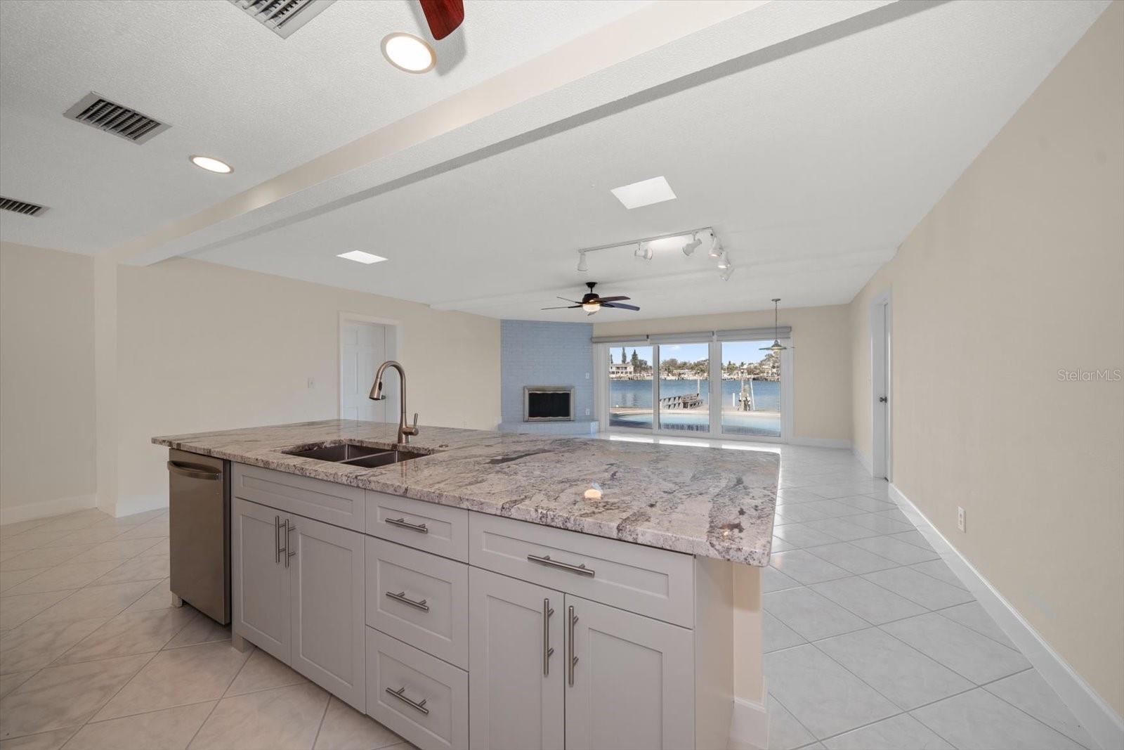 Kitchen Opens to Living Area with Water Views!