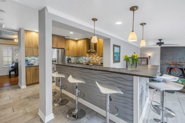 Kitchen with Raised Bar and Seating For 6