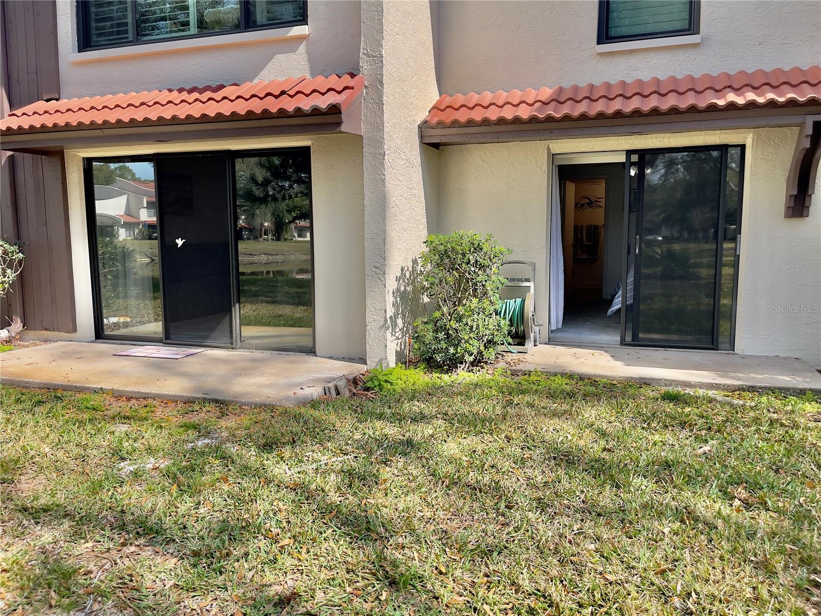 Two patios - living room & Primary bedroom