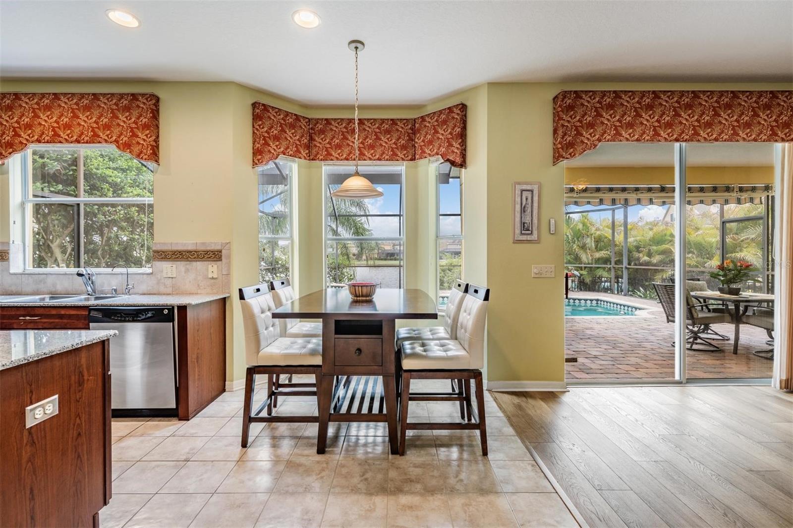 Sunny eat-in area with lanai views