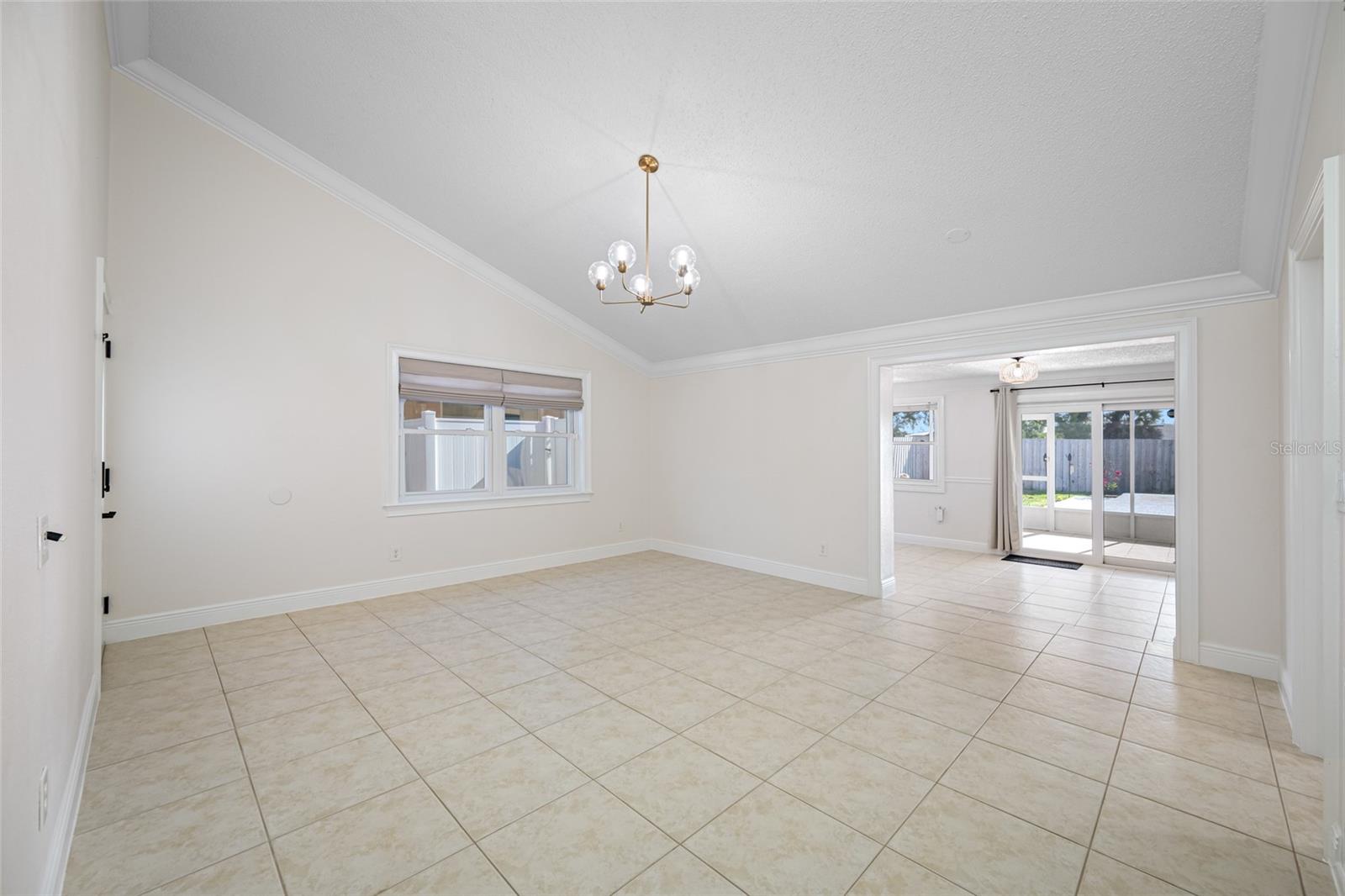 Living room with vaulted ceiling