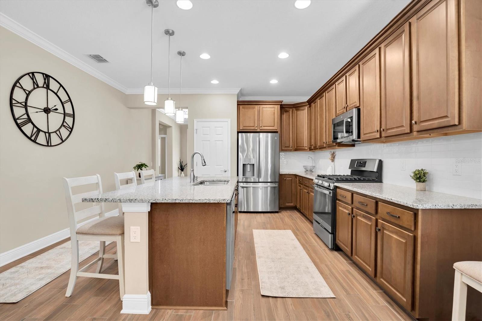 AN ABUNDANCE OF SOLID MAPLE CABINETS