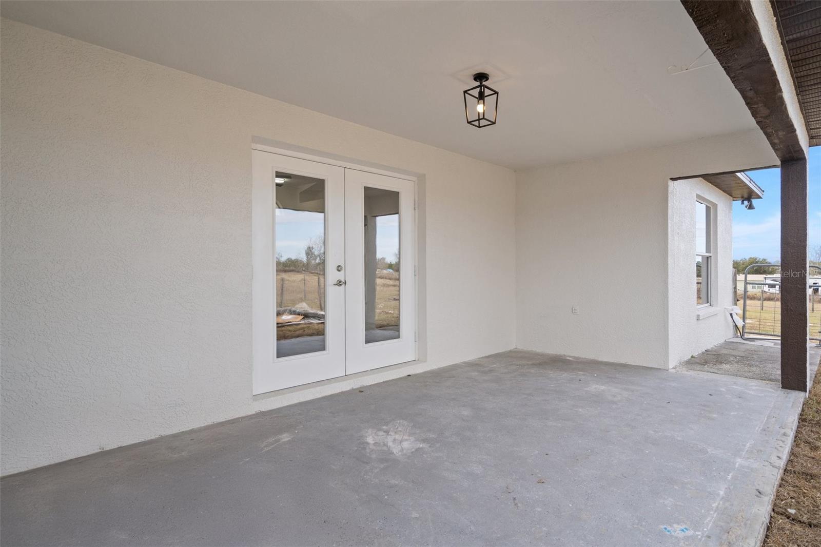 Double french doors to the rear lanai!