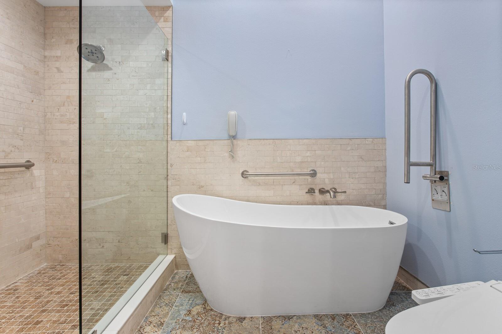 Stand alone soaking tub and large walk in shower!