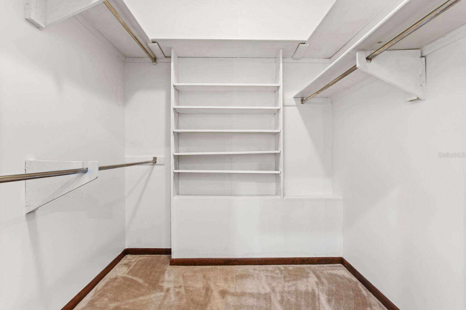 Large walk in closet with built ins!