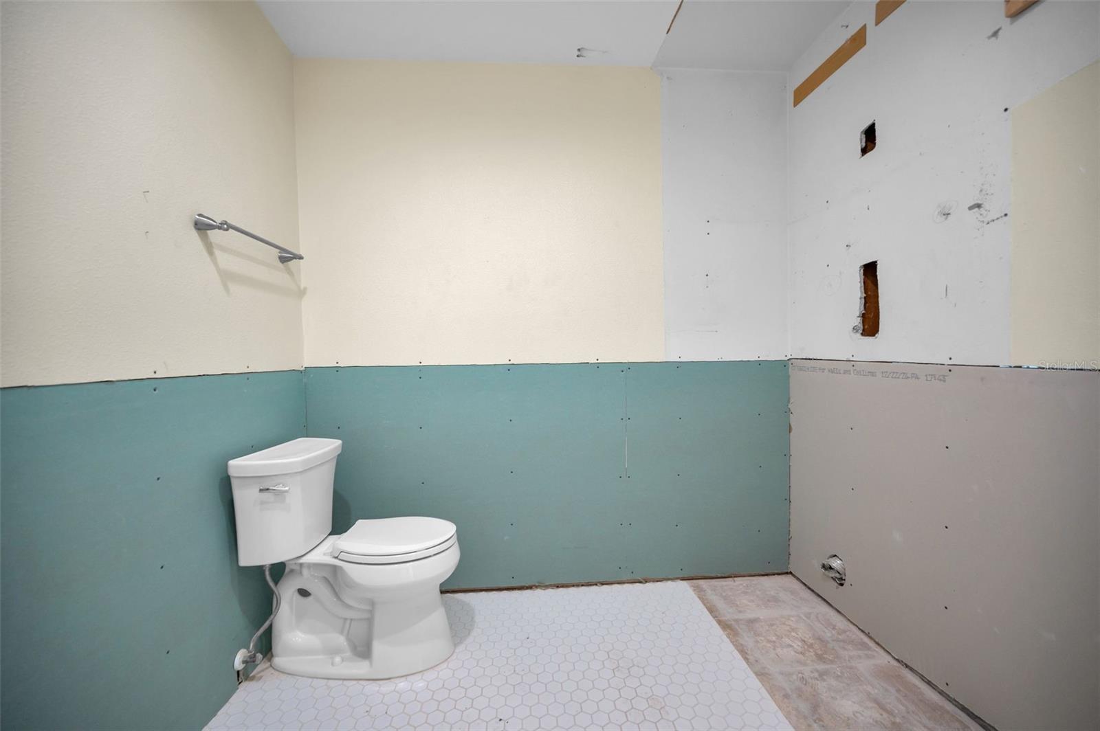 Bathroom 2 and Laundry Area