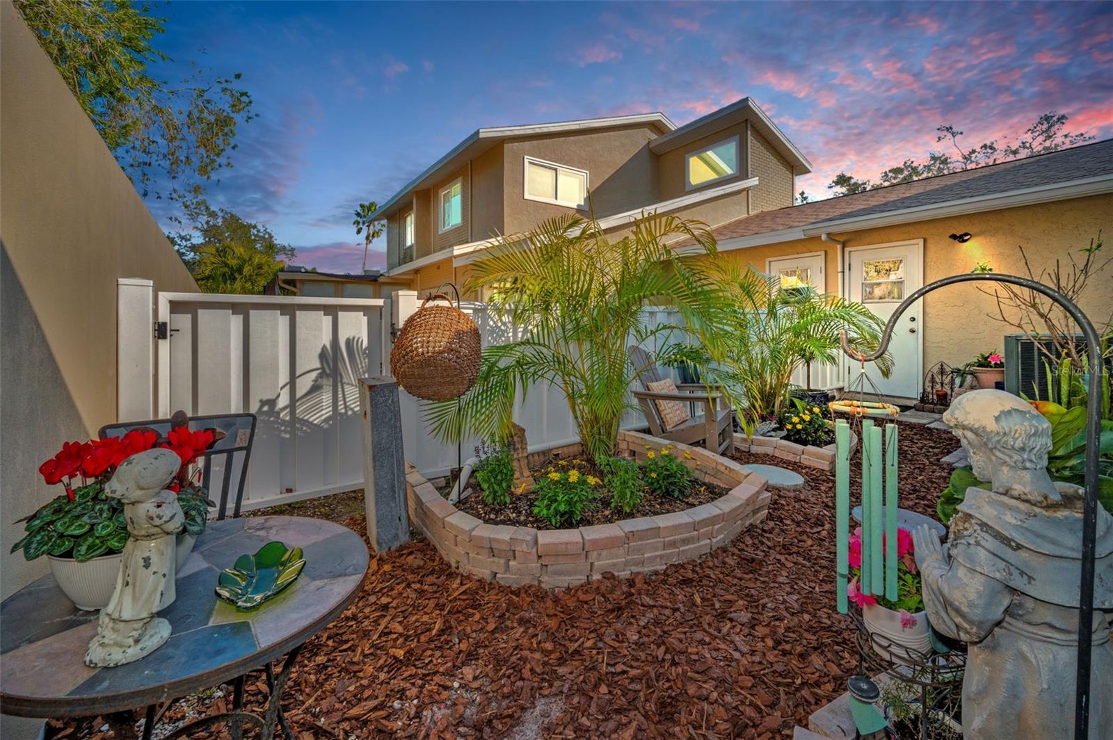 A zen-like fenced backyard perfect for entertaining or enjoying the peace & quiet...CHECK!