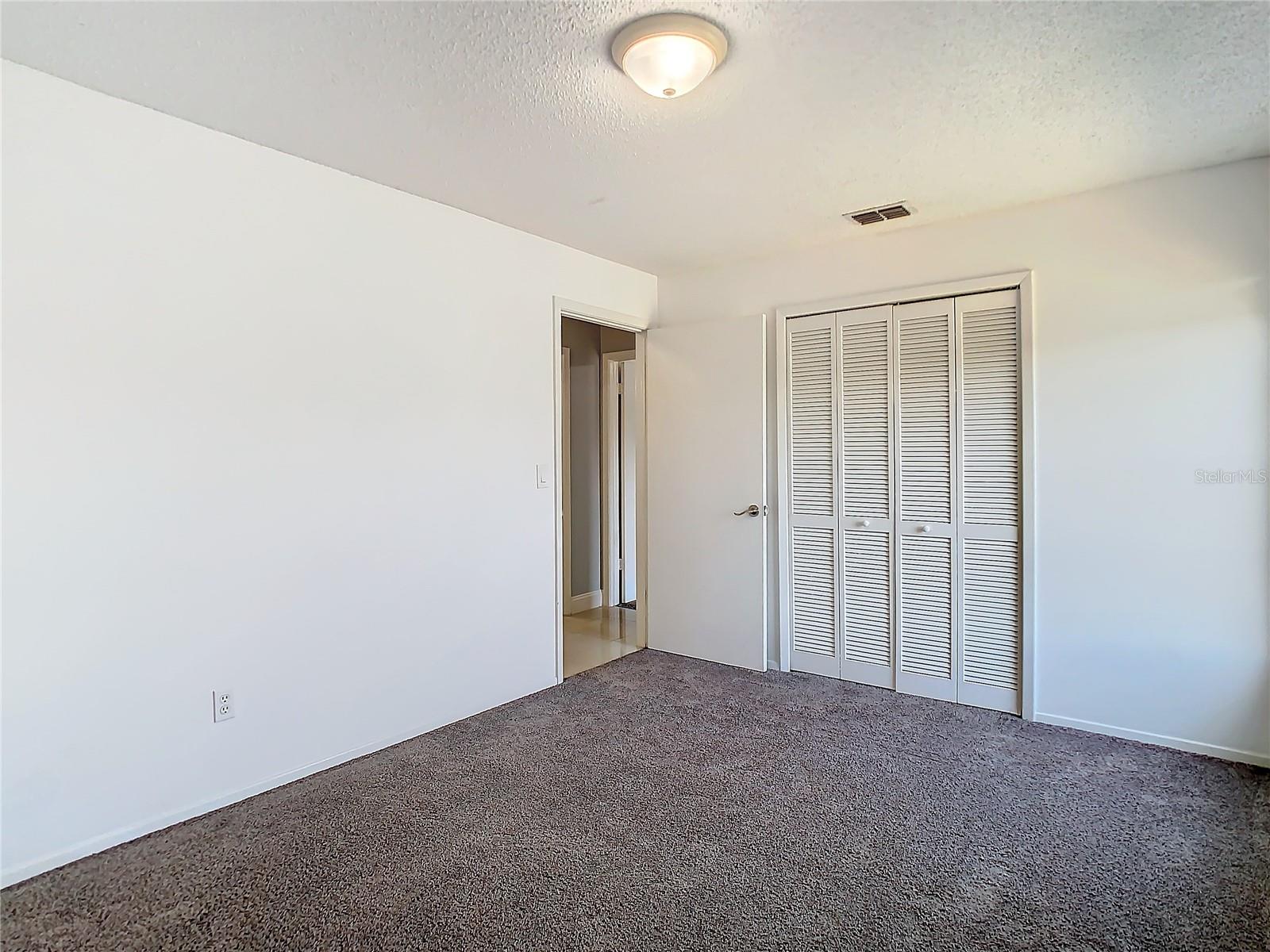 Picture of Bedroom 2, complete with a closet