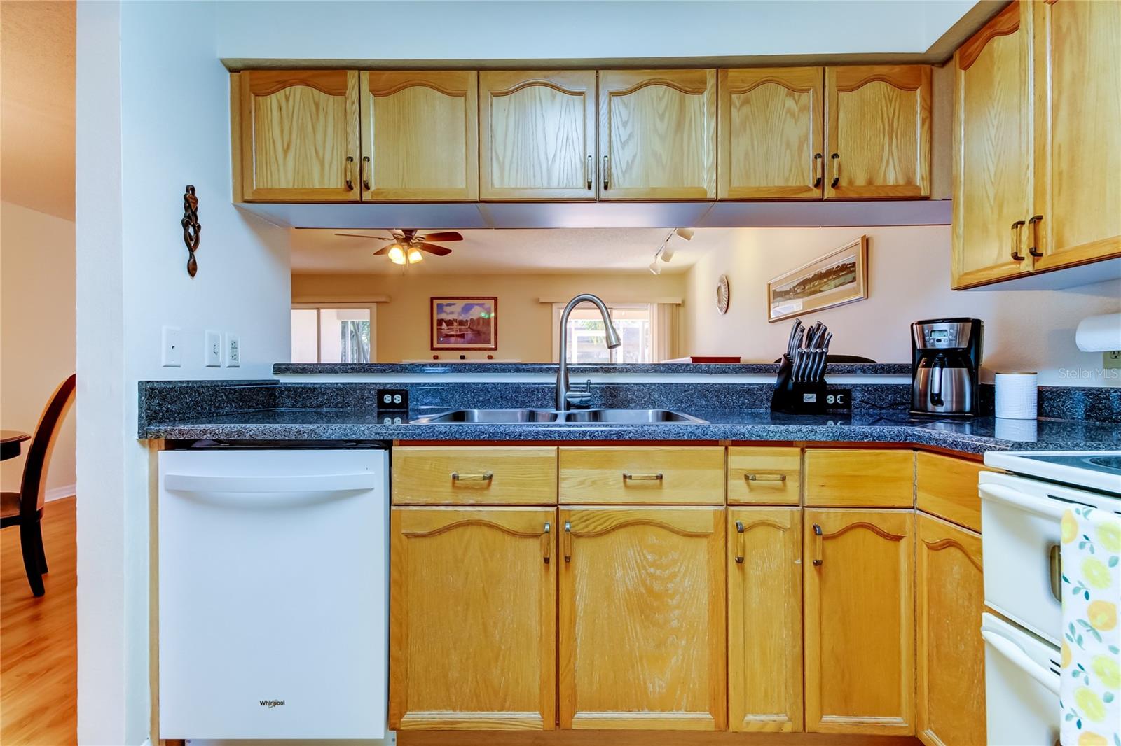 37. Kitchen (9.1' x 15.3')  Offers Upper & Lower Solid Wood Cabinets Aplenty!