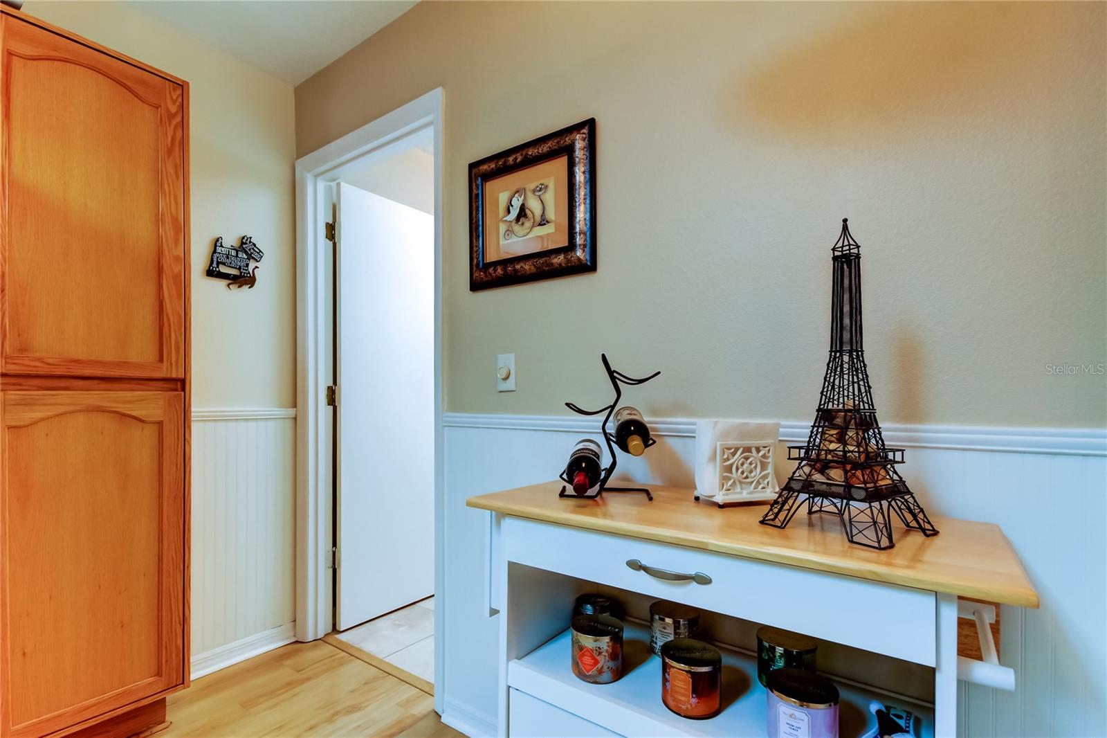 41. Kitchen (9.1' x 15.3') Peaking into the Laundry Room..