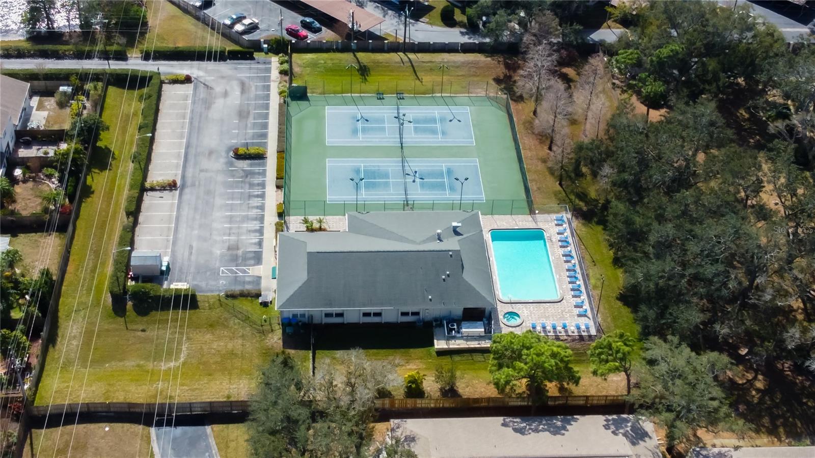 67. Aerial Views of Amenities on the West Edge = You Have a HUGE Clubhouse w/ Full Kitchen.. Available to Rent Out! Alongside Another Lake, Pool, Hottub, Tennis / Pickleball Courts!