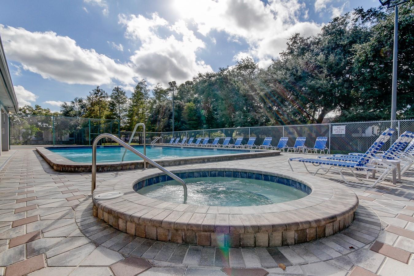 70. Aerial Views of Amenities on the West Edge = You Have a HUGE Clubhouse w/ Full Kitchen.. Available to Rent Out! Alongside Another Lake, Pool, Hottub, Tennis / Pickleball Courts!