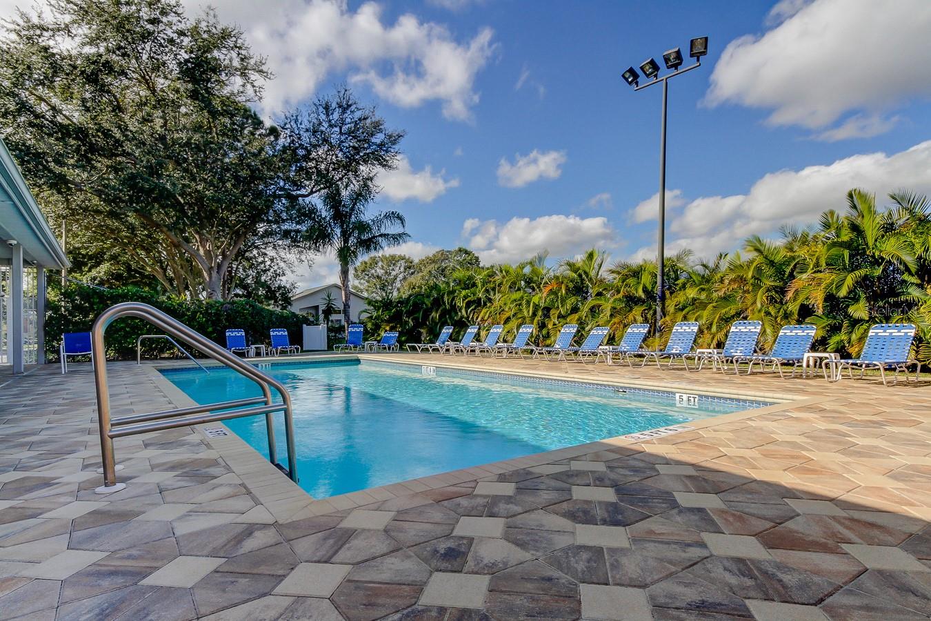 74. This is the EAST Edge of Community Pool & Hot Tub Site.. Restrooms Bldg, Plenty of Loungers.. and Crystal Clear Sparkling Water!