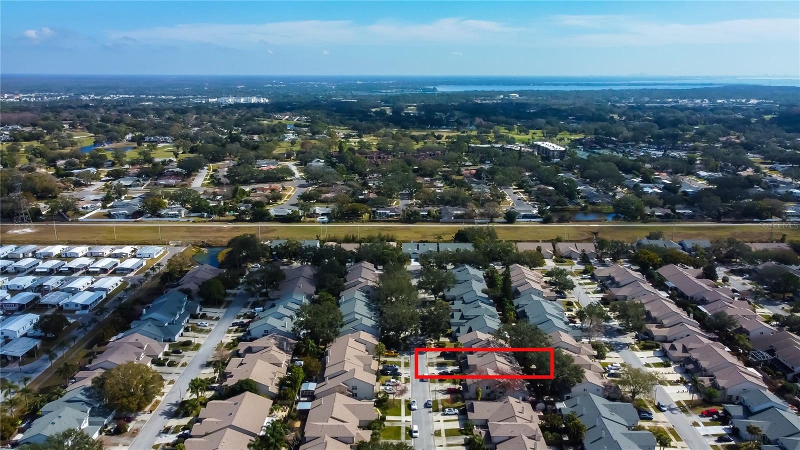 13. Aerial Views Looking Eastward You Can SEE the Pinellas Trail Aligned with the Community! Hit the Trail for a Relaxing Bike Ride... a Sunset Stroll.. or Sunrise Jog! Get that Body Moving!