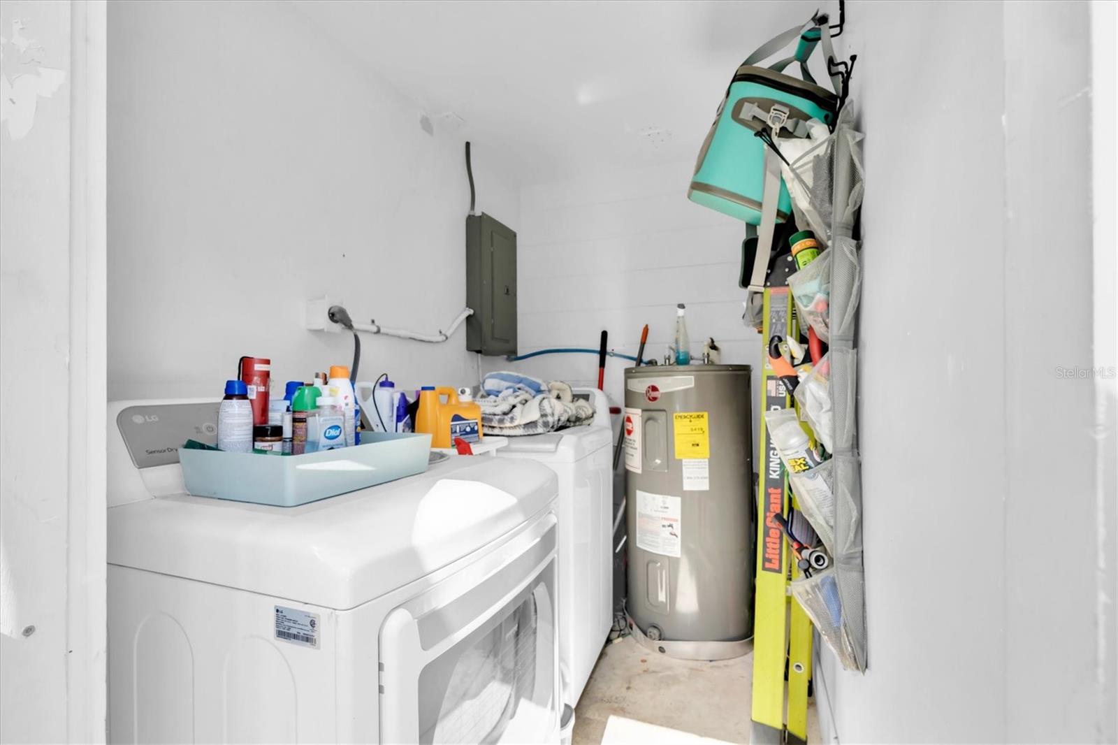 Washer, Dryer, and Hot Water Heater in Utility Room