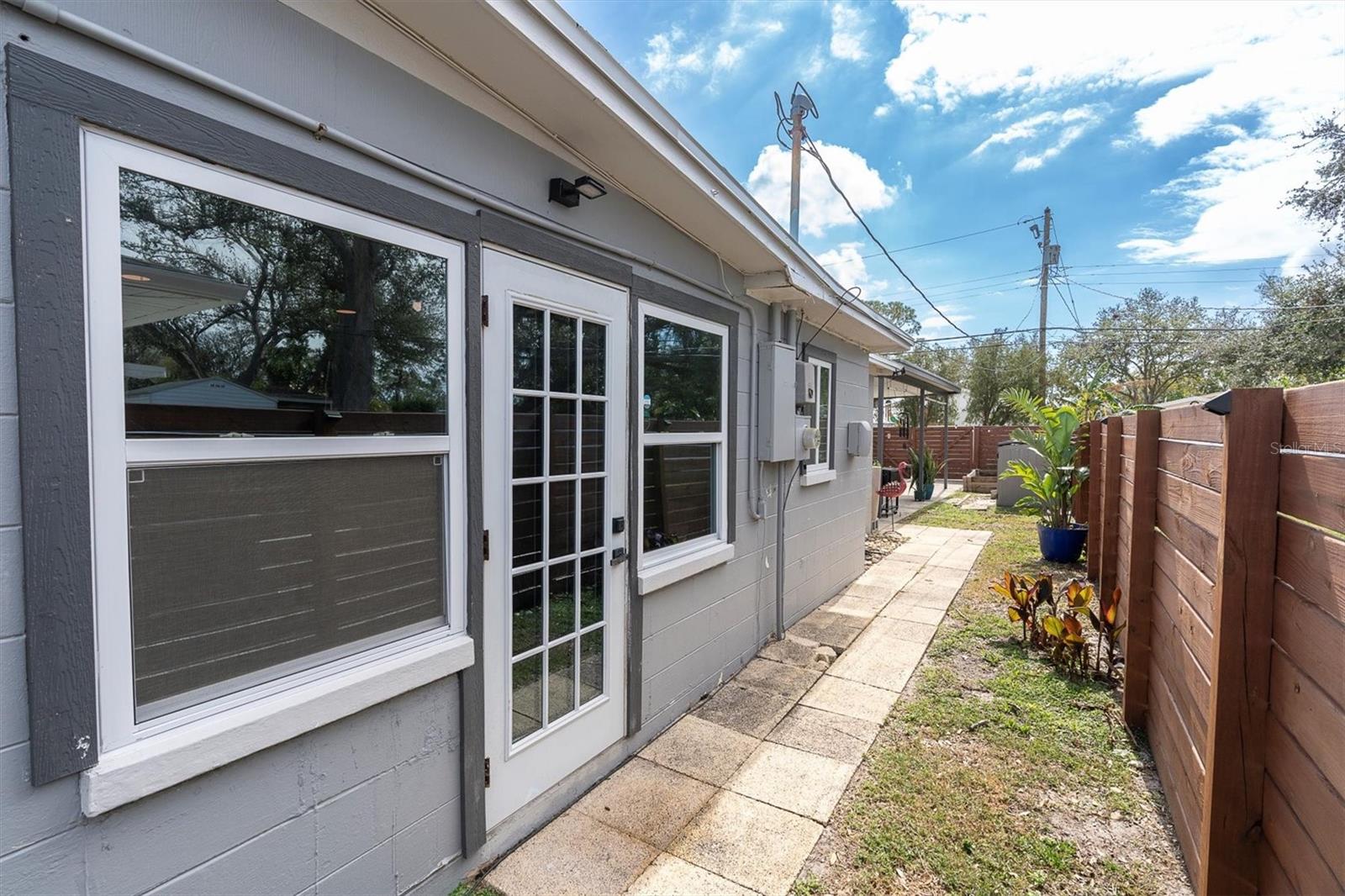 French door from dining area leading to back yard haven.