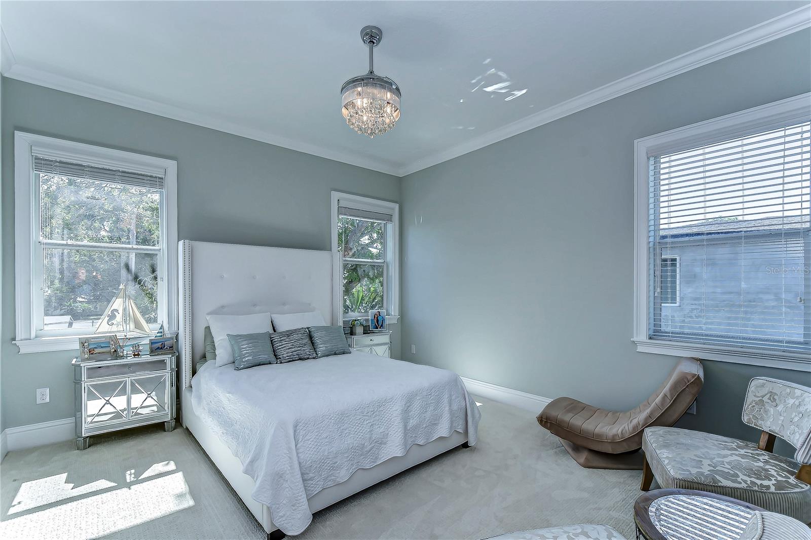 Unwind in this serene fifth bedroom, where elegance meets comfort.