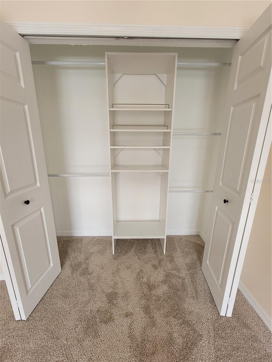 Master Bedroom Closet (His)