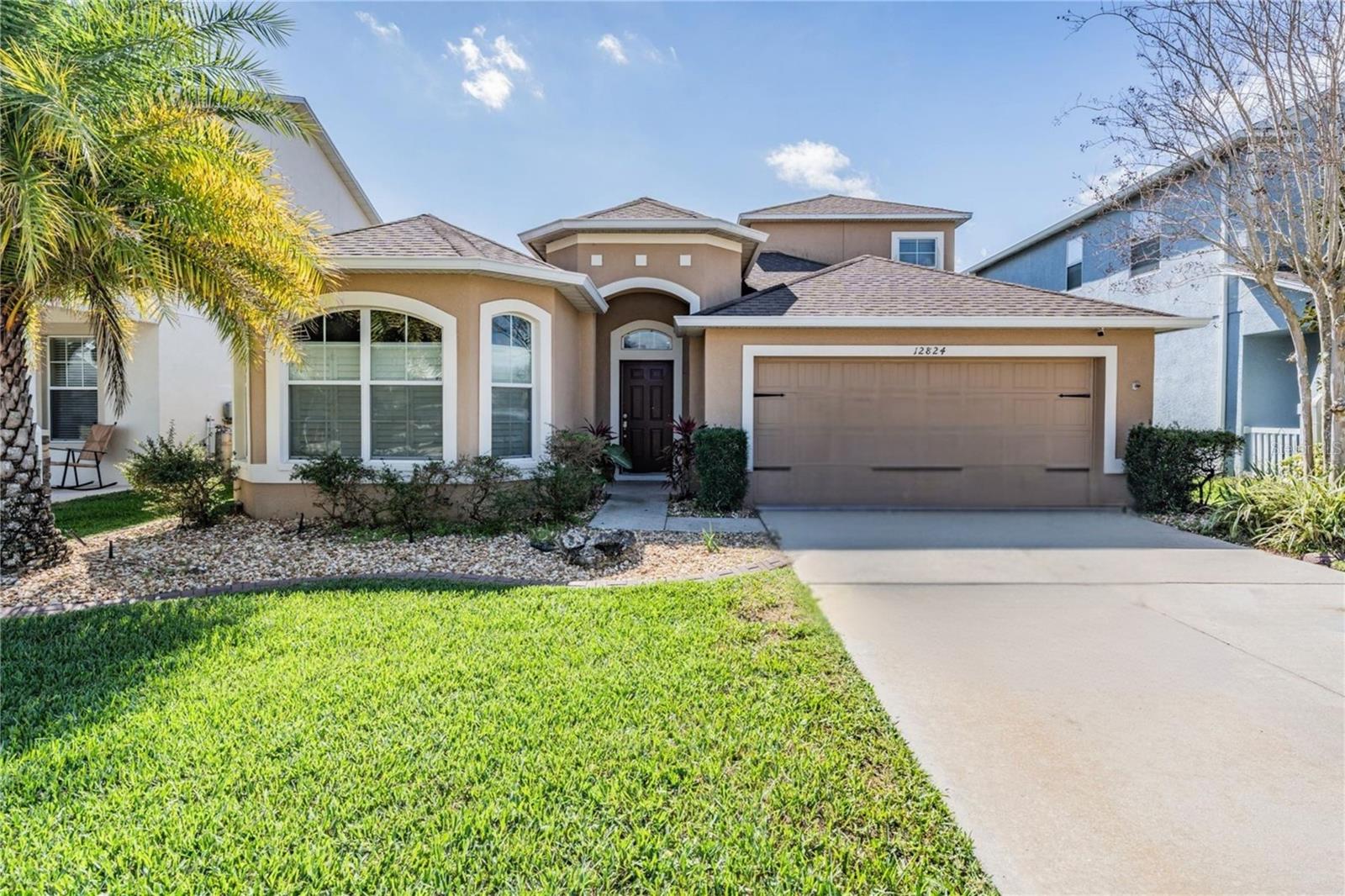 Picture perfect curb appeal with a covered entry