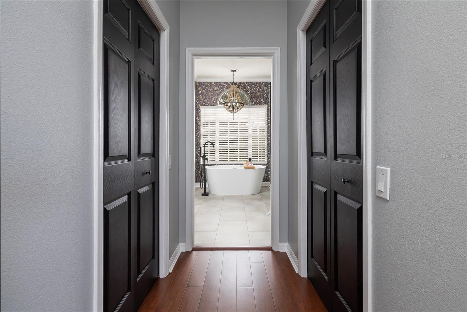 Dual Walk-in Master Closets and entry to Master Bathroom