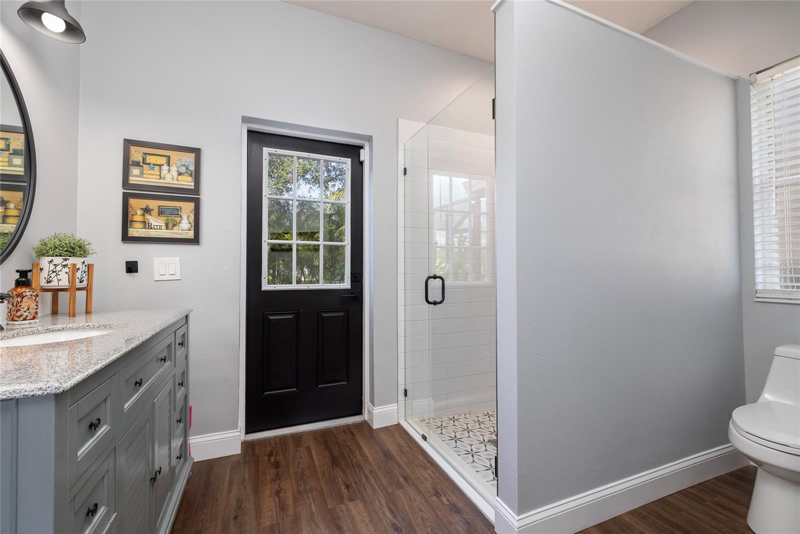 Downstairs full bathroom with access to the pool