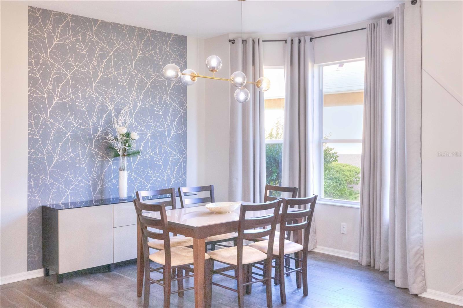 Dining room features a bay window for lots of natural light!