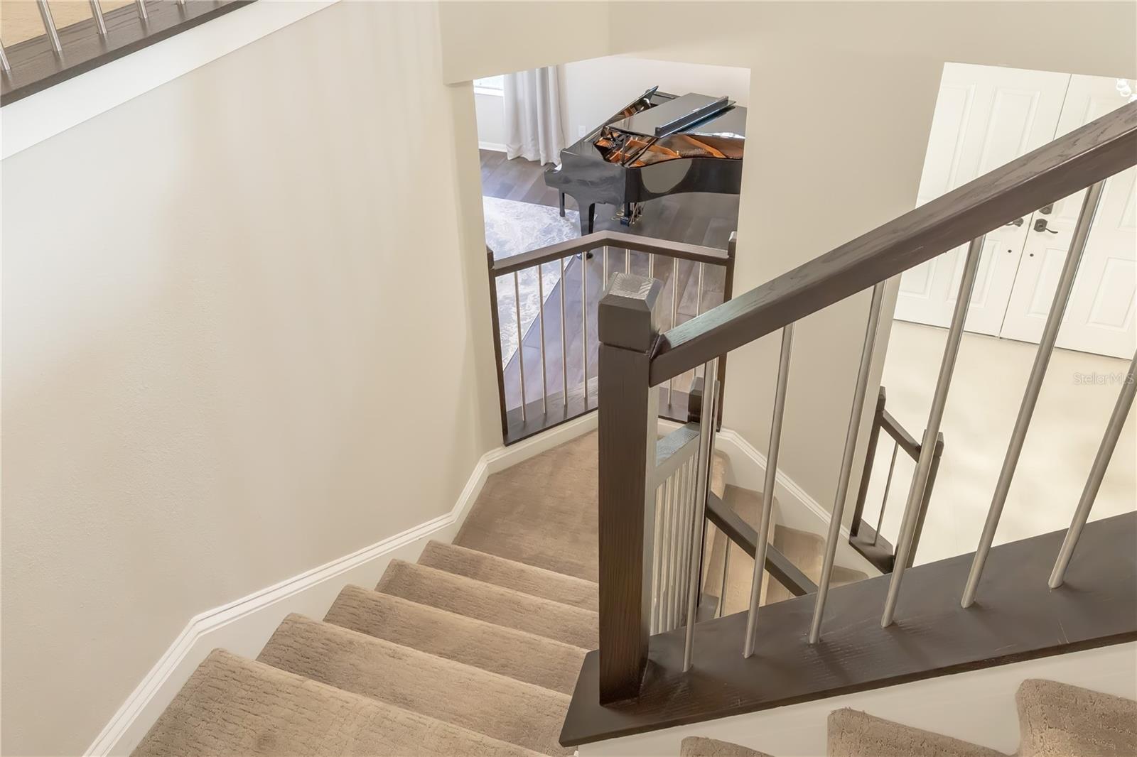 Stairway with updated spindles lead to the 2nd floor...