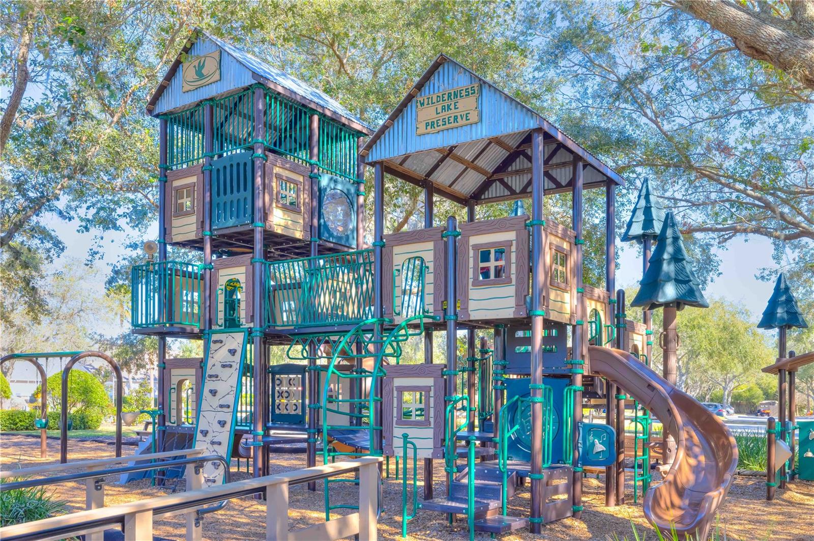 Huge community playground by the pools...