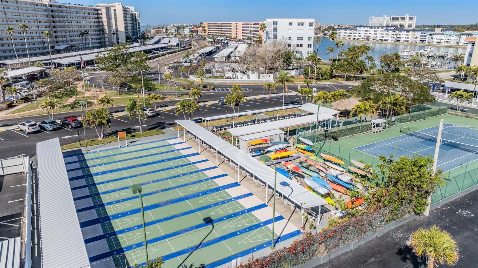 Community shuffleboard, tennis/kayak storage