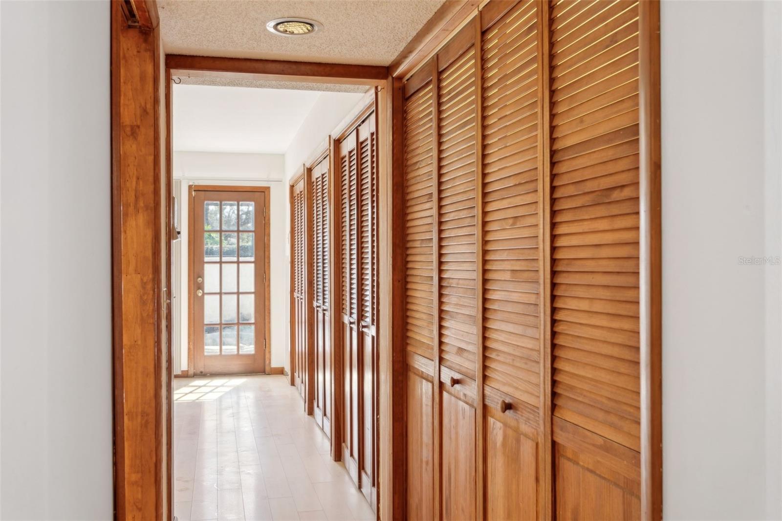 Hallway to primary bedroom