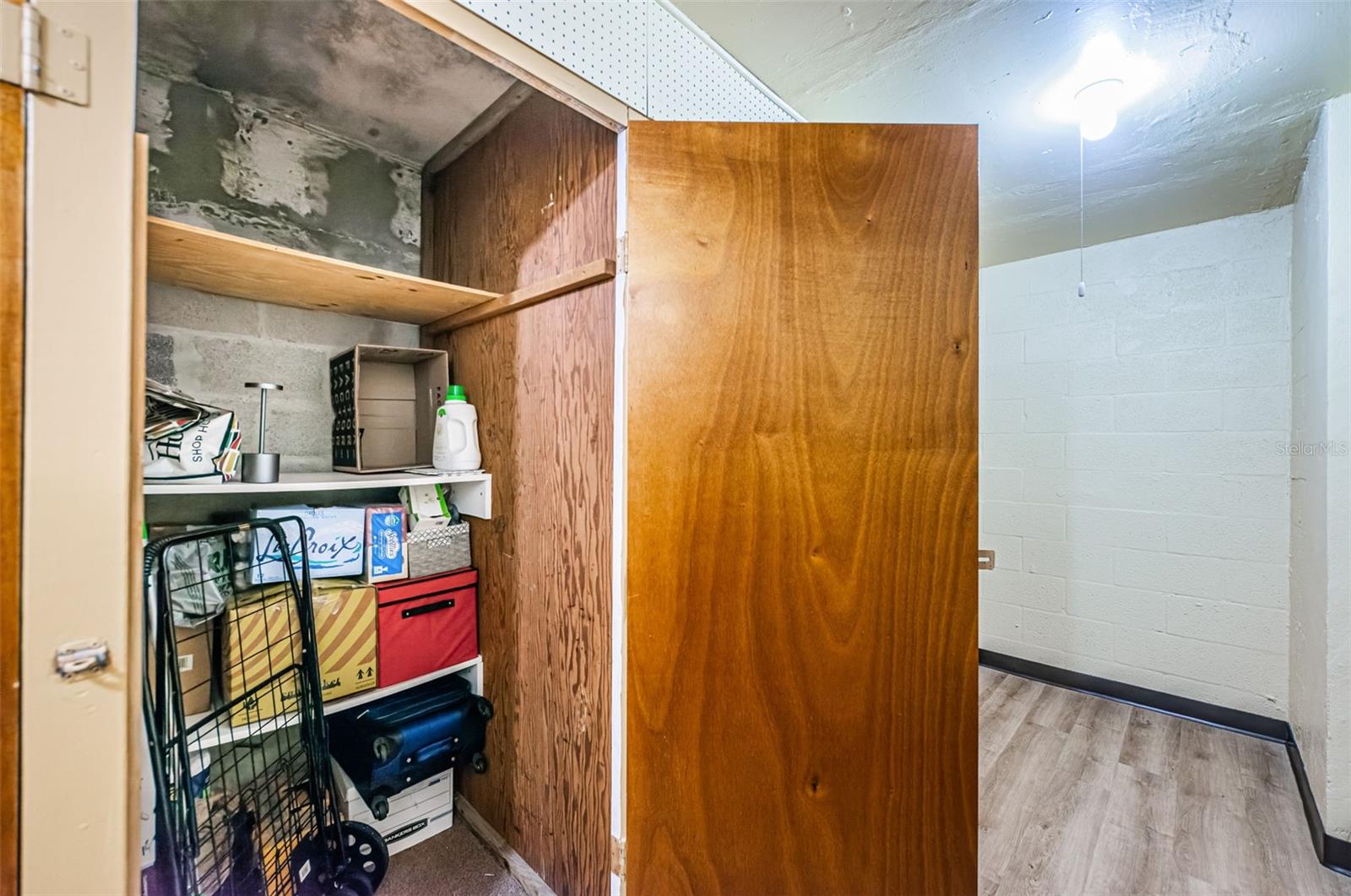 Laundry room just across the hall from the condo