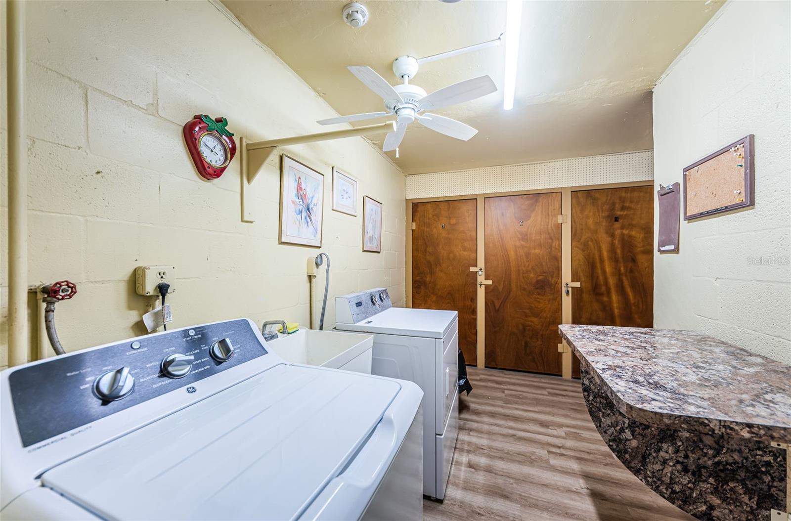 Laundry room just across the hall from the condo