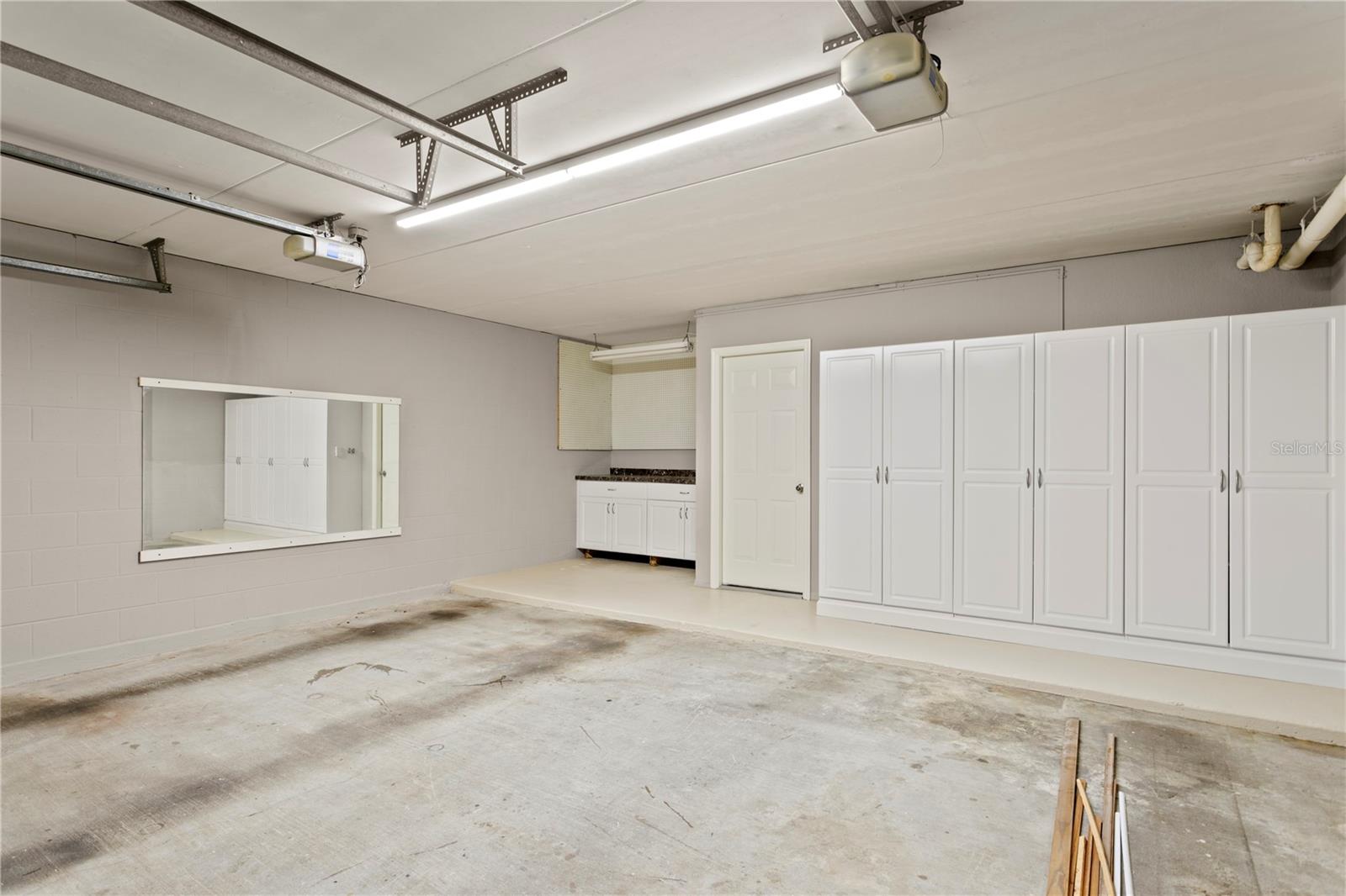 2 car garage with built in shelving