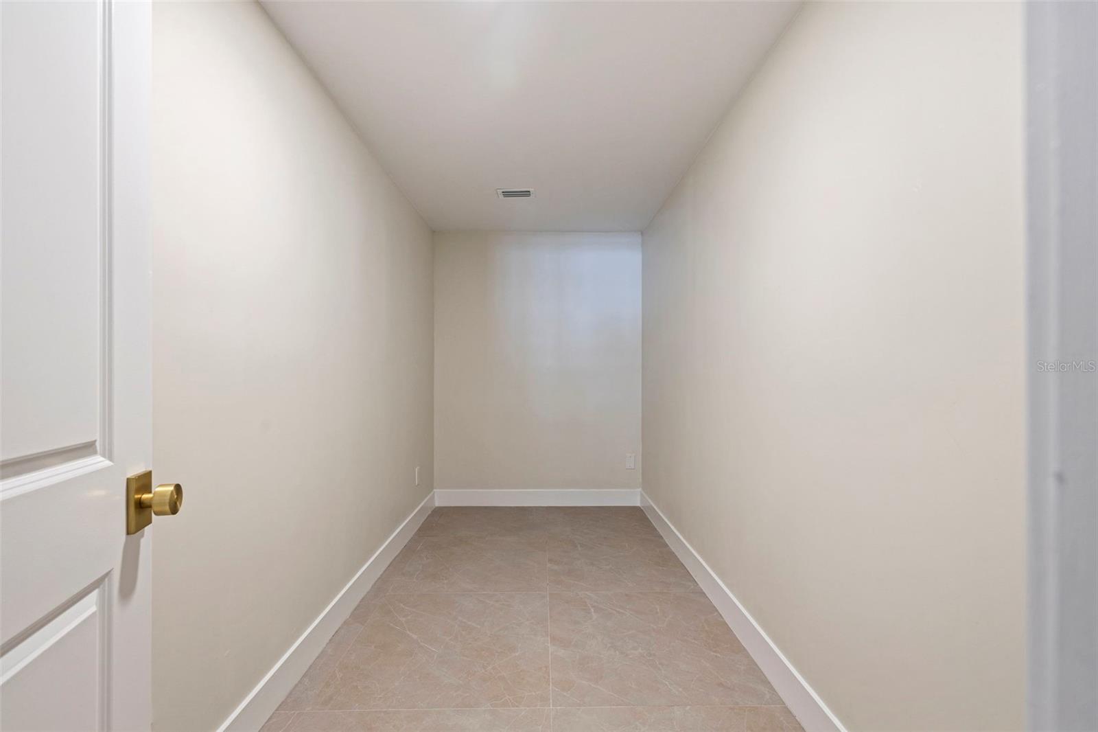 Primary Bedroom Walk-In Closet