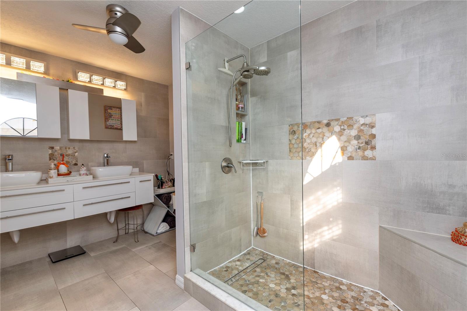 Primary bathroom with walk-in shower.